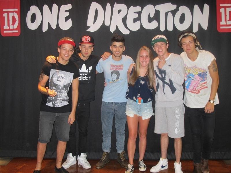 Sophomore Anna Graves has her photo taken with One Direction prior to a concert this summer.