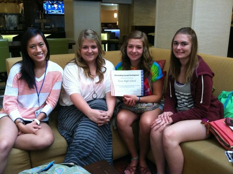 Yearbook editors Chau Dong, Maegan Jordan, Morgan Williams and Katelyn Markham display their yearbook award.