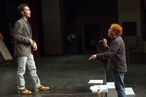 Texarkana College theater director works with senior Taylor Coleman, who plays the lead in this week's opening of "The Music Man."