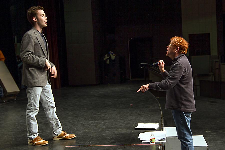 Texarkana College theater director works with senior Taylor Coleman, who plays the lead in this week's opening of "The Music Man."