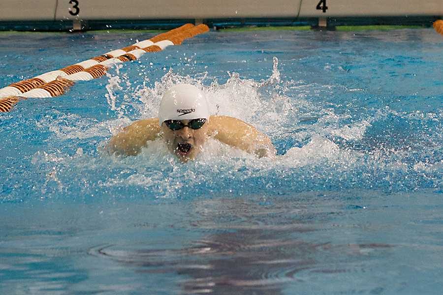 Senior+Chris+Radomski+swims+the+100-yard+butterfly+at+the+state+meet+in+Austin.+He+won+the+gold+medal+in+the+event.