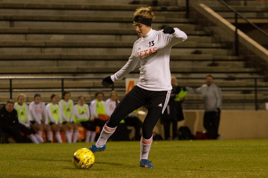 Hannah Brantley dribbling down the field.