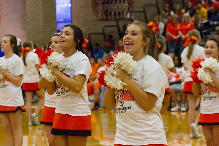 Sophomore+Jayci+Pettigrew+cheers+at+a+pep+rally.