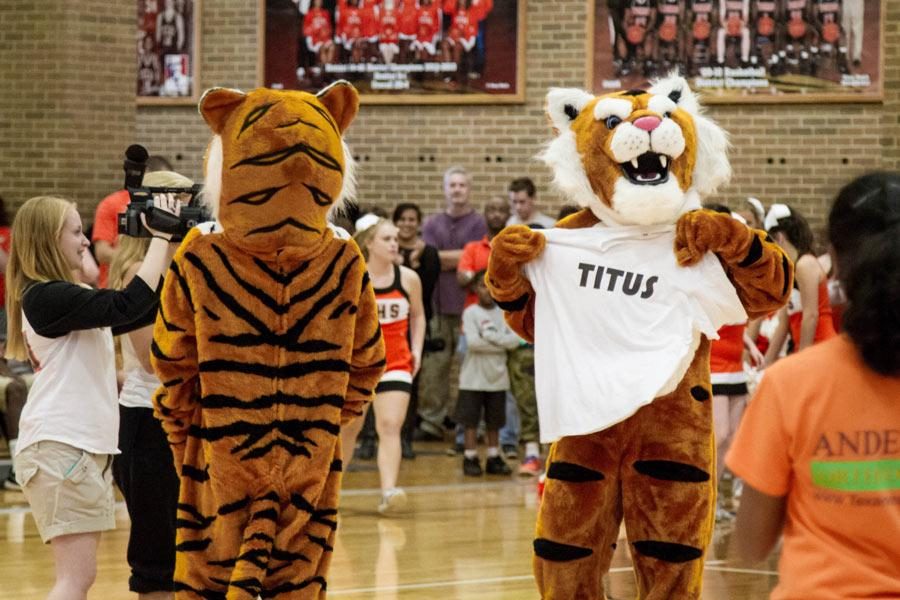 The new mascot flaunts shirt that reveals new name voted on by the student body at pep rally