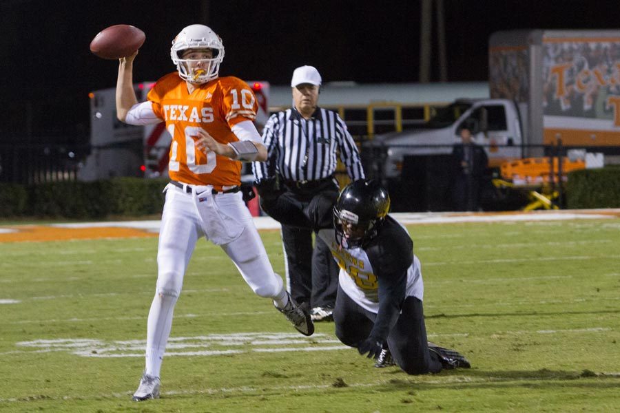 Kade Pearson evades a Mt. Pleasant defender during the Nov. 7, 2014 game at Grimm Park.