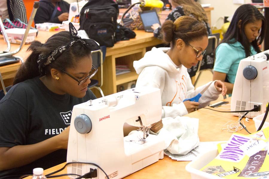 Students in fashion design class do their part for overseas charity by making dresses for little girls in need