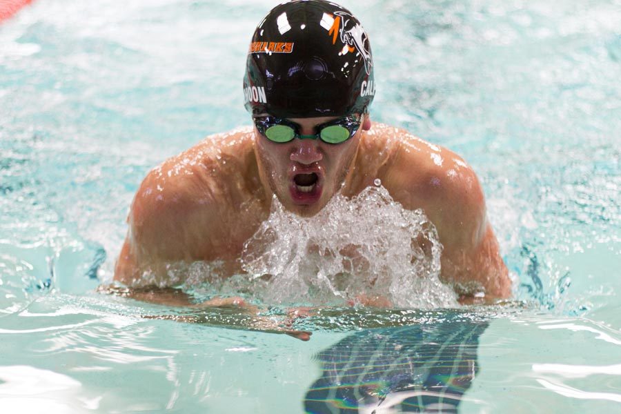 Junior Luke Calhoon competes in the breast stroke during the Orange and White Swim Meet held at the Pinkerton Center on the campus of Texarkana College.