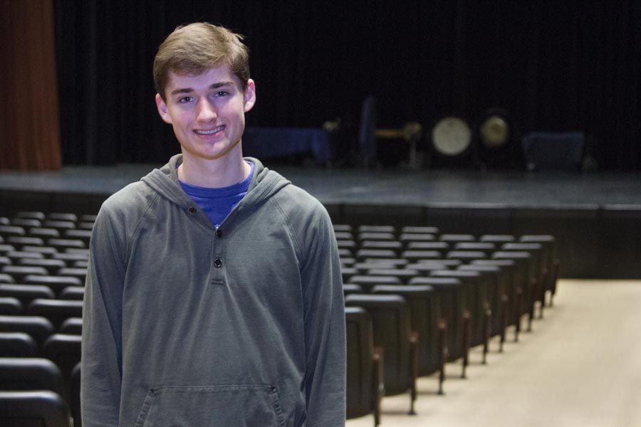 Senior Reece Griffin standing in front of the Sullivan Performing Arts Center where he has often starred. 