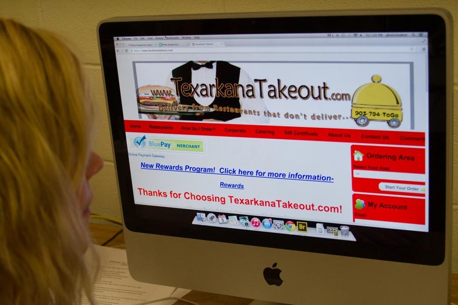 Senior Sara Rogers checks out TexarkanaTakeout.com in search of a way to be delivered food.