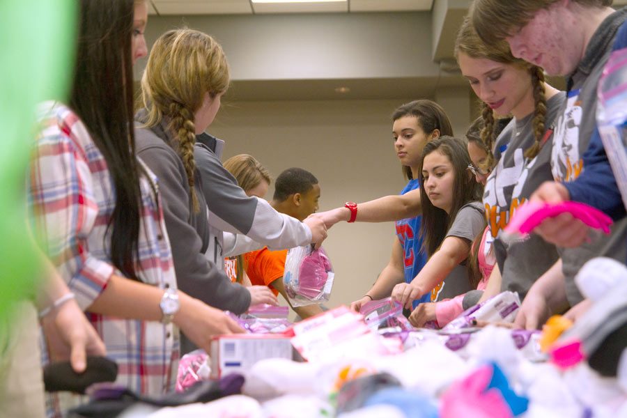 Students participate in Spring Forum by helping other schools in activities.