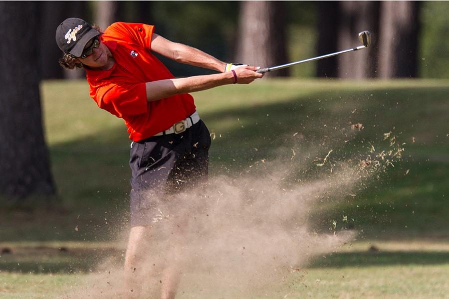 Junior Grayson Jones competes in District Tournament.