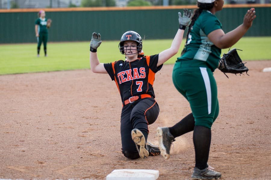 Sophomore Braley Turner slides into third during the Longview game. 