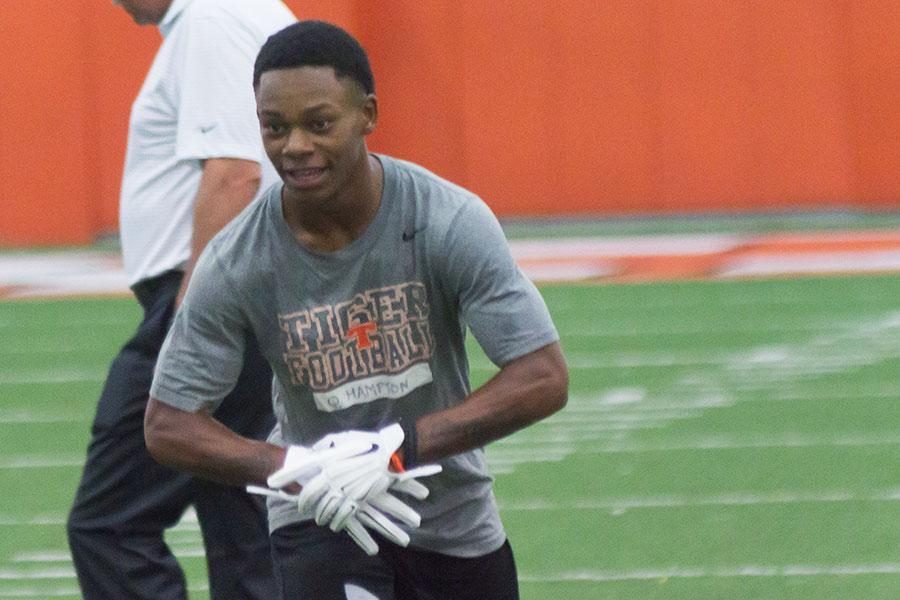 Junior Quan Hampton gets ready to run the ball in summer practice. 