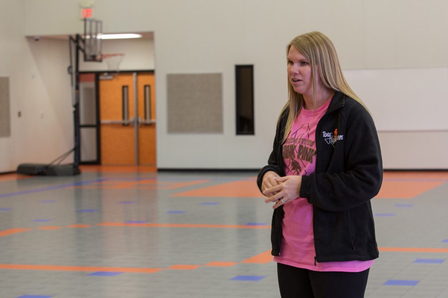 New drill team director Amber Reynolds leads a practice. 