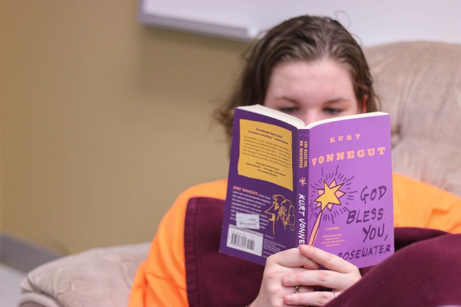 Junior Katie Dusek enjoys a  Kurt Vonnegut novel.