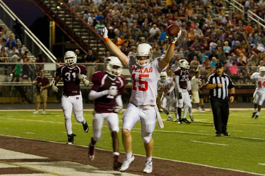 Kip Williams celebrates his touchdown recepetion against Whitehouse. The Tigers defeated the Wildcats 48 - 20 in the 2015 season opener