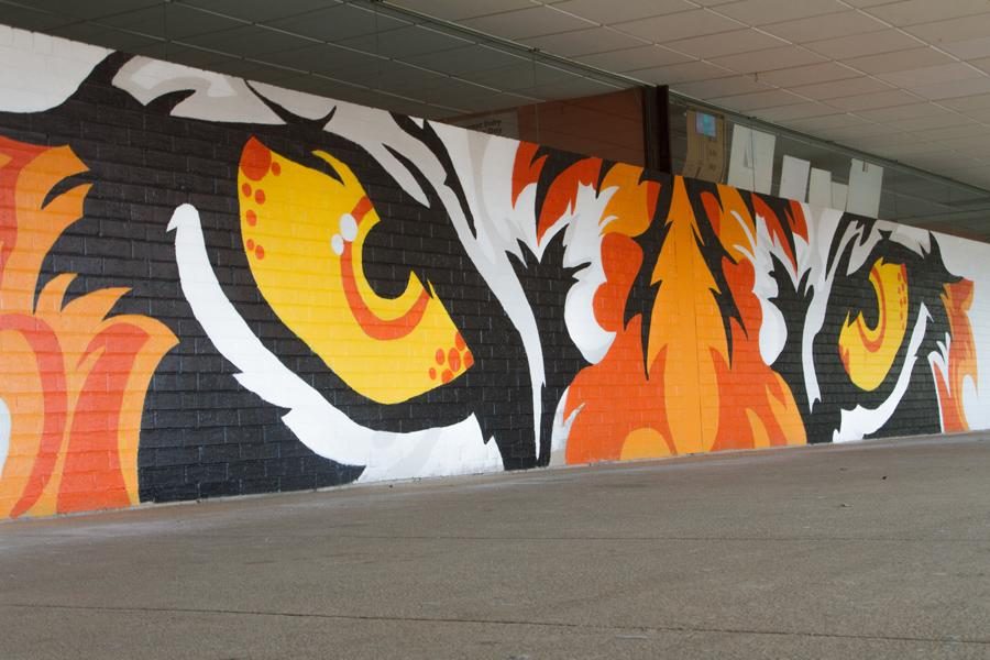 Gone are the ugly brown lockers that once lined the hallways of Texas High School. New art work now occupies the void left by the lockers. 