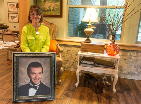 Debbie Autrey displays a portrait of her son, Will. Will died of drug overdose in 2014.