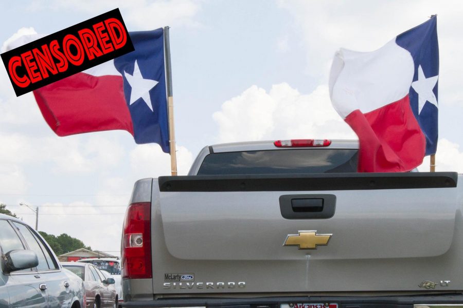 Texas flags fly in the beds of pickup trucks at Texas High School during the Texas vs. Arkansas game week. Some flags were vandalized with obsenities  the Wednesday before the game.