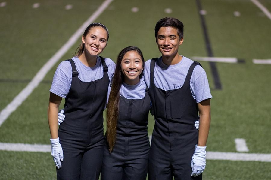 Drum majors Elizabeth Colvin, Alanna Tran, Odin Contreras