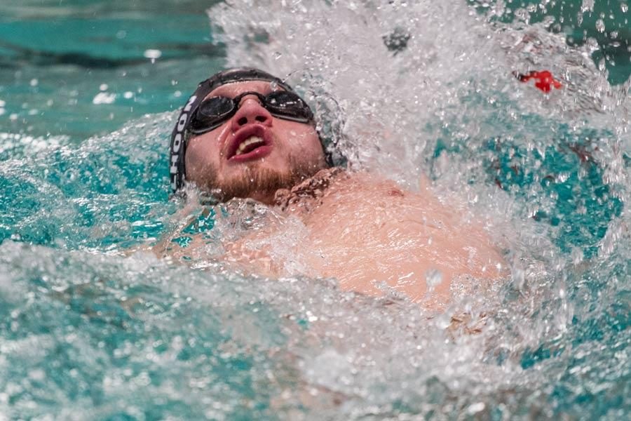 Texas High Schools Luke Calhoon performs the backstroke Nov. 20, 2015 during the opening day of the TISCA meet held in the Pinkerton Center of Texarkana College.