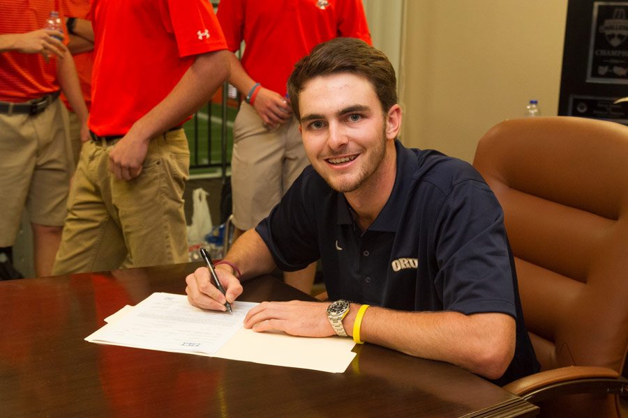 Senior Grayson Jones prepares to sign to Oral Roberts University. Jones will be playing Division 1 golf with ORU starting next fall.