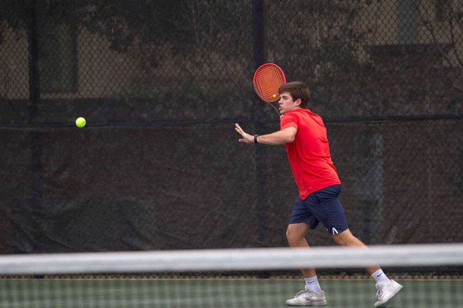 Junior Hutch Tidwell practices the evening before the first match of the State Team Tennis Tournament in College Station. The Tigers will face Grapevine in the first round of the tournament on Nov. 11, 2015.