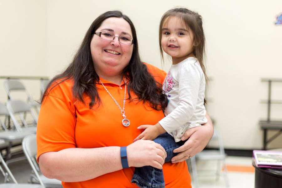 Joni Stephenson poses for a picture with her daughter, Maria. Stephen fostered Maria for two years until she was finally able to adopt her in November.
