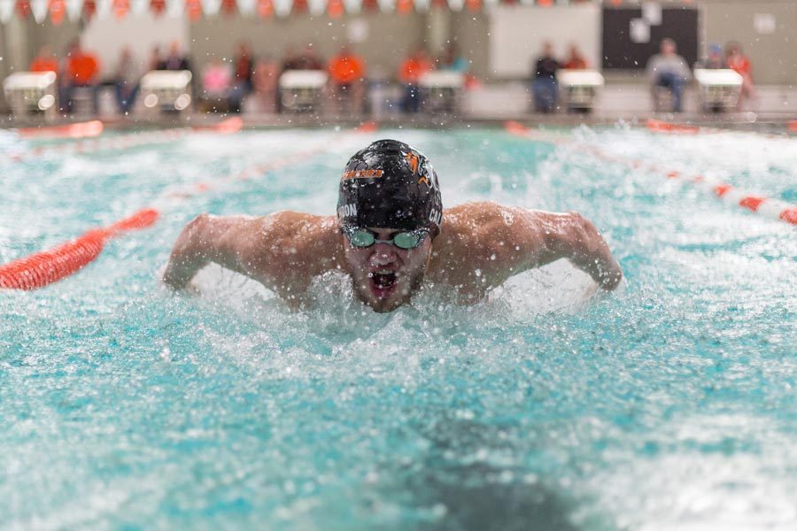 Senior+Luke+Calhoon+swims+the+200+yard+individual+medley+at+the+district+meet+on+Saturday.