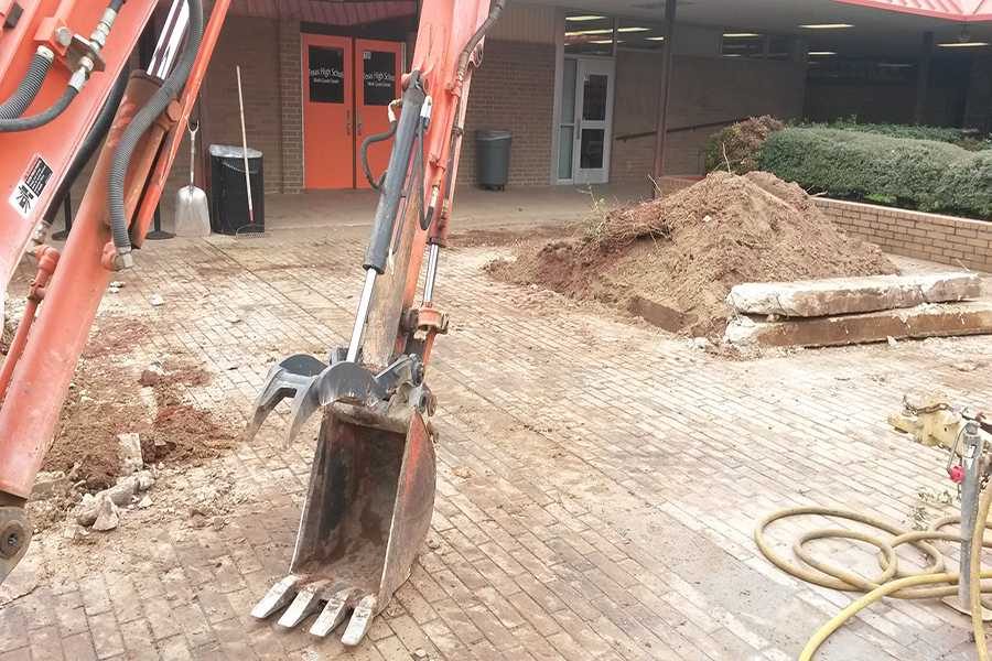 The bushes were removed from the courtyard over Christmas break. 