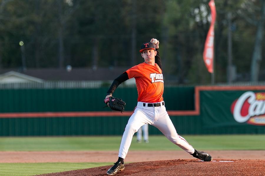 Senior Zack Philips pitches against Pine Tree.