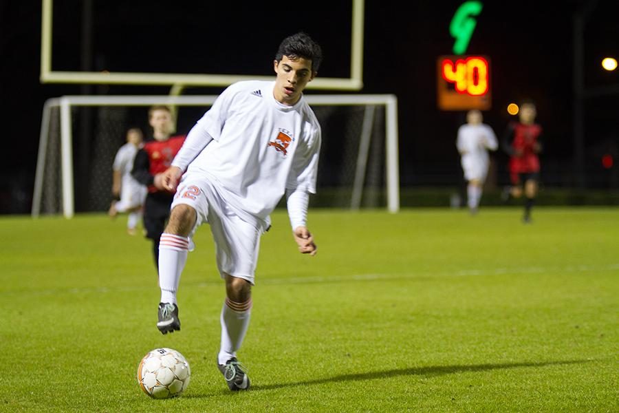 Junior Alejandro Hernandez handles the ball against Greenville.