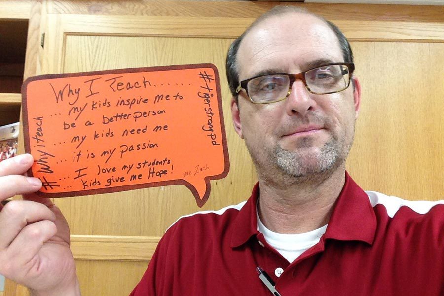 Chuck Zach poses with his #WhyITeach bubble for social media. Photo by @czach91 on Twitter.