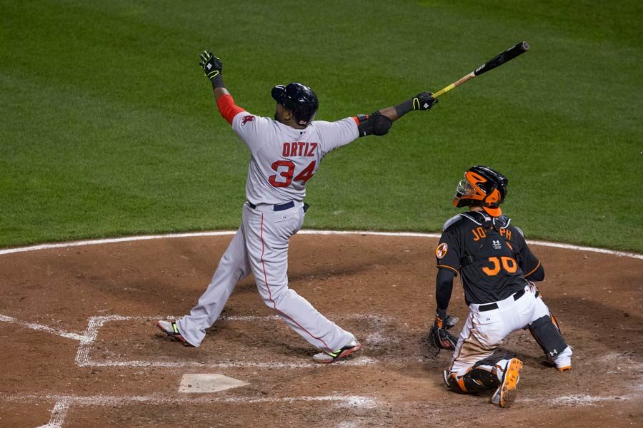 David Ortiz smashes a homerun against the Baltimore Orioles.
photo by Keith Allison. Used with permission.