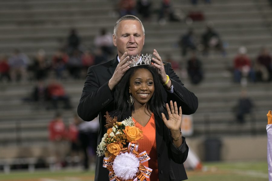 Principal Brad Bailey crowns Jasmine Grace Brooks as Homecoming queen.