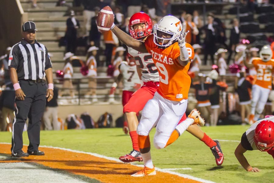 Texas Highs Tevailance Hunt celebrates his touchdown in the first quarter against Greenville. The Tiger win makes their record 8-0.