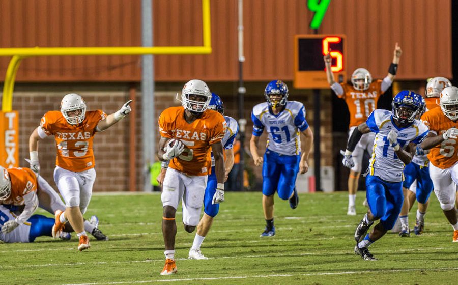 Senior Devuntay Walker rushes for a 69-yard touchdown in the third quarter against Sulphur Springs. Texas High improved their record to 6-0 with a win against the Wildcats.