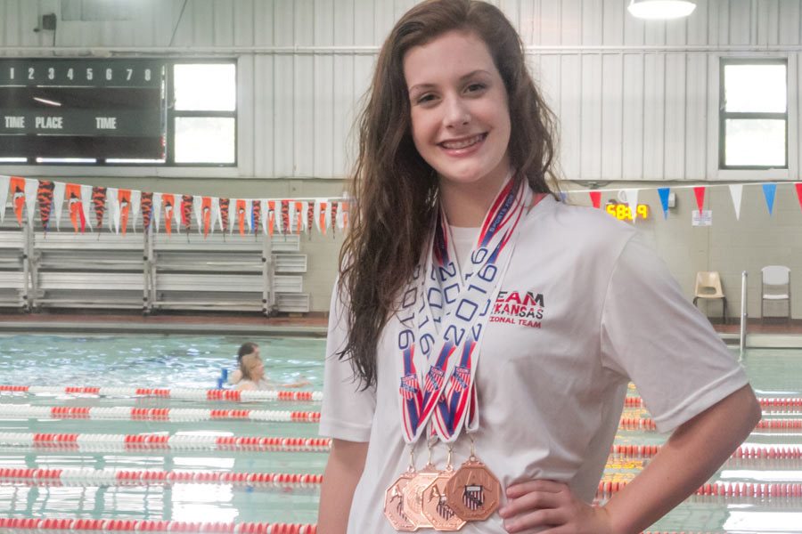 Freshman Haley Wood poses with the medals she won at the Junior Olympics. 