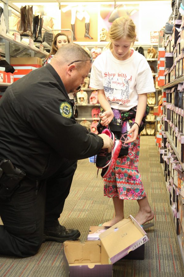 Local first responders take a break from daily activities to spread holiday cheer. The 25th annual Shop with a Cop was held on December 6, 2016.