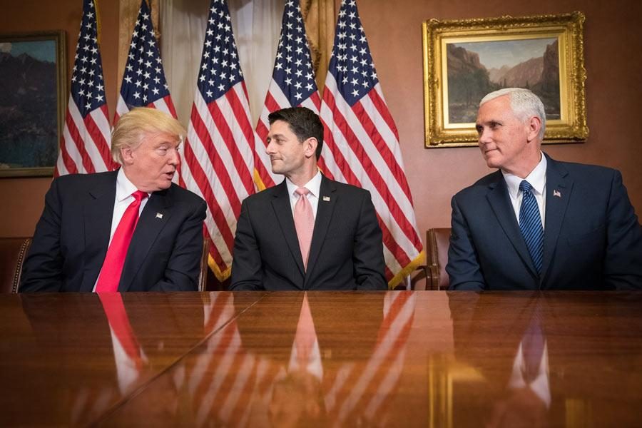 President Trump chats with Speaker of the House Paul Ryan and Vice President Mike Pence. Both men were present for Trumps first congressional speech Tuesday, and were seated directly behind him. Photo by Caleb Smith