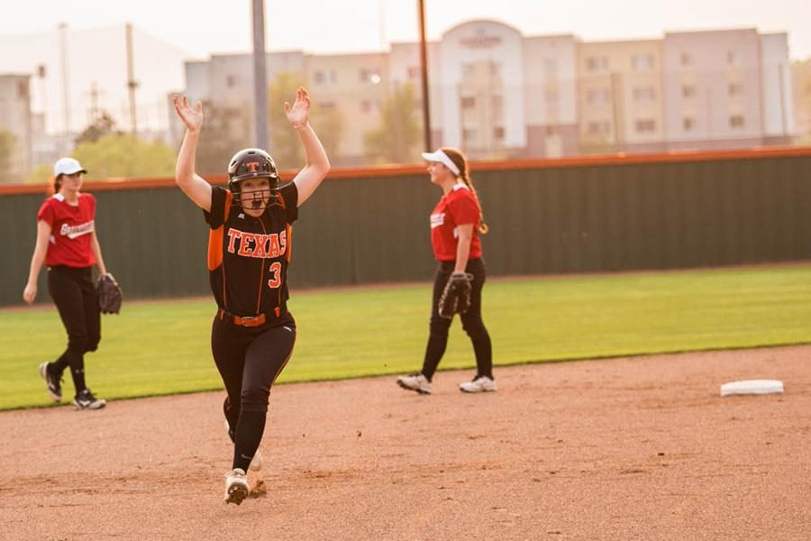 Freshman Bailey Groom runs to third base with excitement after hitting her very first home run. The Lady Tigers battled it out against Greenvilles Lady Lions on March 28, 2017.