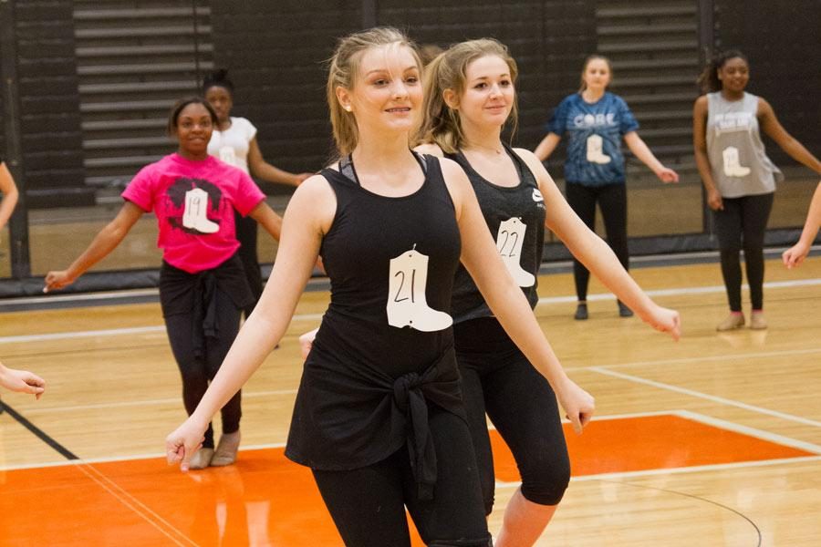 Freshman Margaret Debenport performs in front of the judges during tryouts. This year, girls who have been on the team for three years were not required to try out.