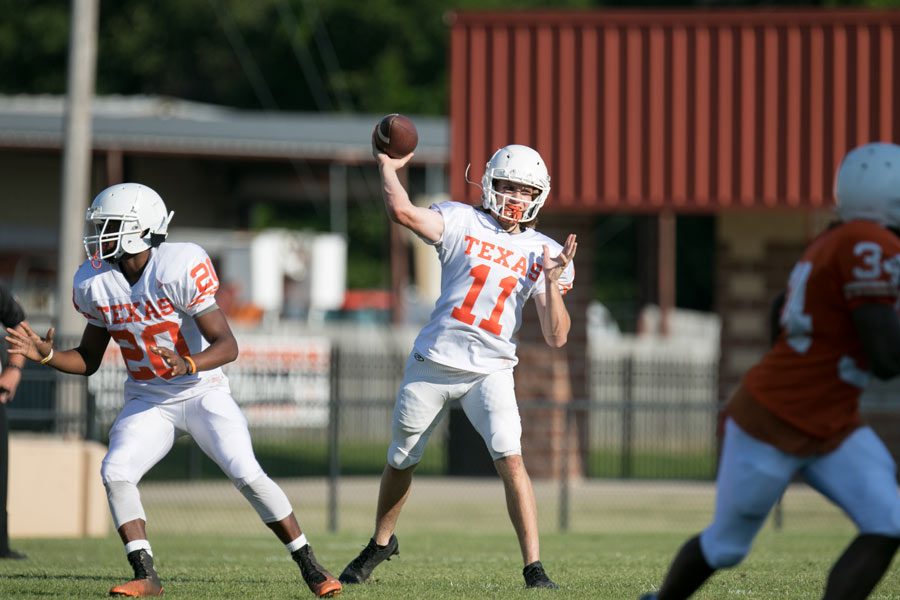 Junior Riley Russell makes a pass at the Spring Game. This tradition was renewed under the new Athletic Director.
