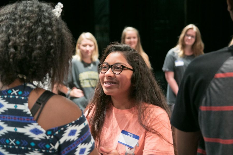 Students enthusiastically greet one another during the first Tiger Theatre Company camp. 