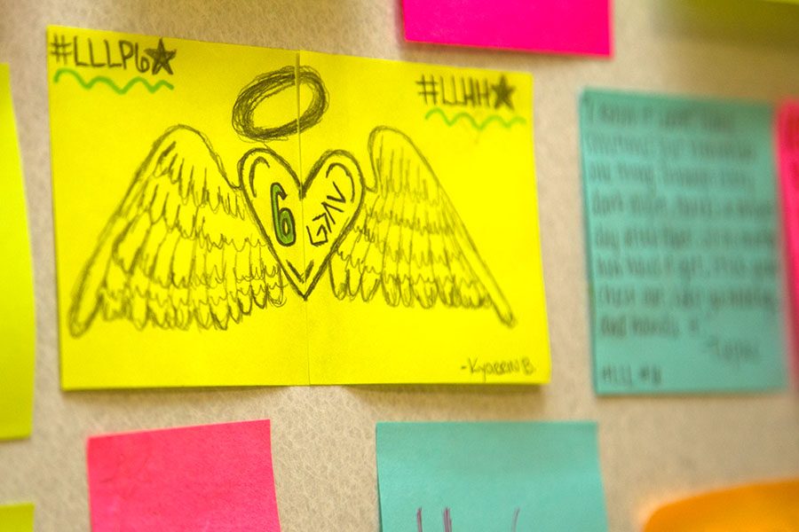 Positive Post-It Notes line the walls of the English hallway as a way to show support to the student body. 