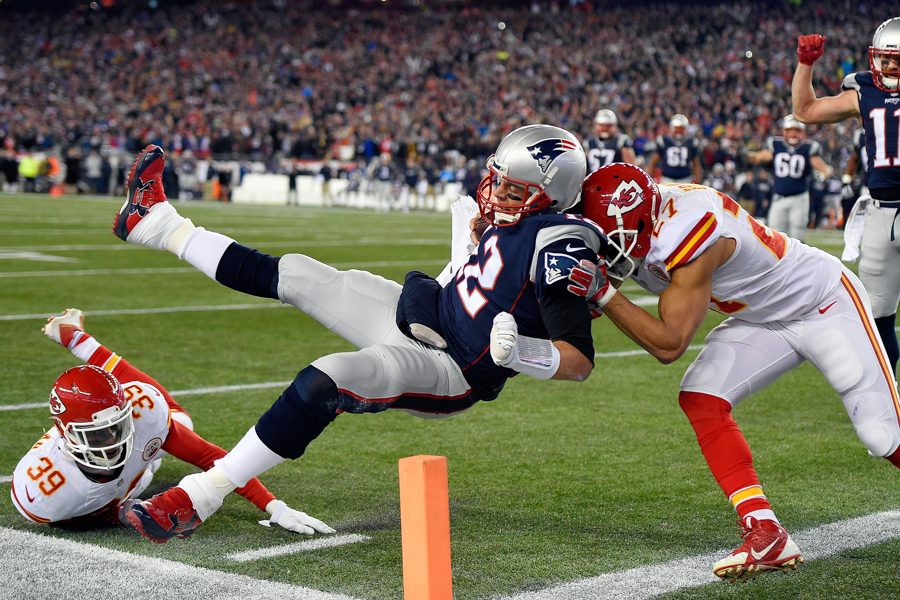 Kansas City Chiefs cornerback Sean Smith (21) and free safety Husain Abdullah (39) stop New England Patriots quarterback Tom Brady (12) short of a touchdown in the second quarter in the AFC divisional playoffs on Saturday, Jan. 16, 2016, at Gillette Stadium in Foxborough, Mass. The Patriots advanced, 27-20. (David Eulitt/Kansas City Star/TNS)