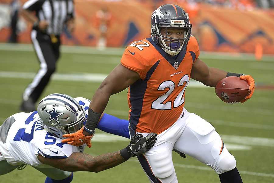 Dallas Cowboys outside linebacker Damien Wilson (57) bring down Denver Broncos running back C.J. Anderson (22) during the first quarter on Sunday, Sept. 17, 2017 at Sports Authority Field at Mile High in Denver, Colo. (Max Faulkner/Fort Worth Star-Telegram/TNS)