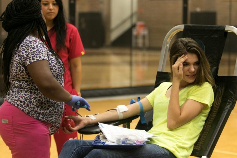 Senior Sierra Self gives blood at last years blood drive.