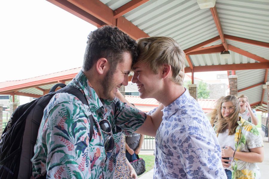 Seniors Brennon Cope and Colton Johnson put their heads together in excitement after finding out what roles they will be performing.