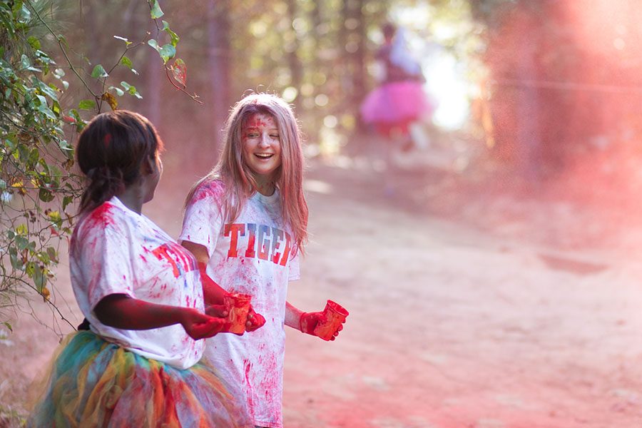 Seniors+Jera+Davis+and+Kamryn+Hamilton+ran+last+years+CASA+Color+Run.+